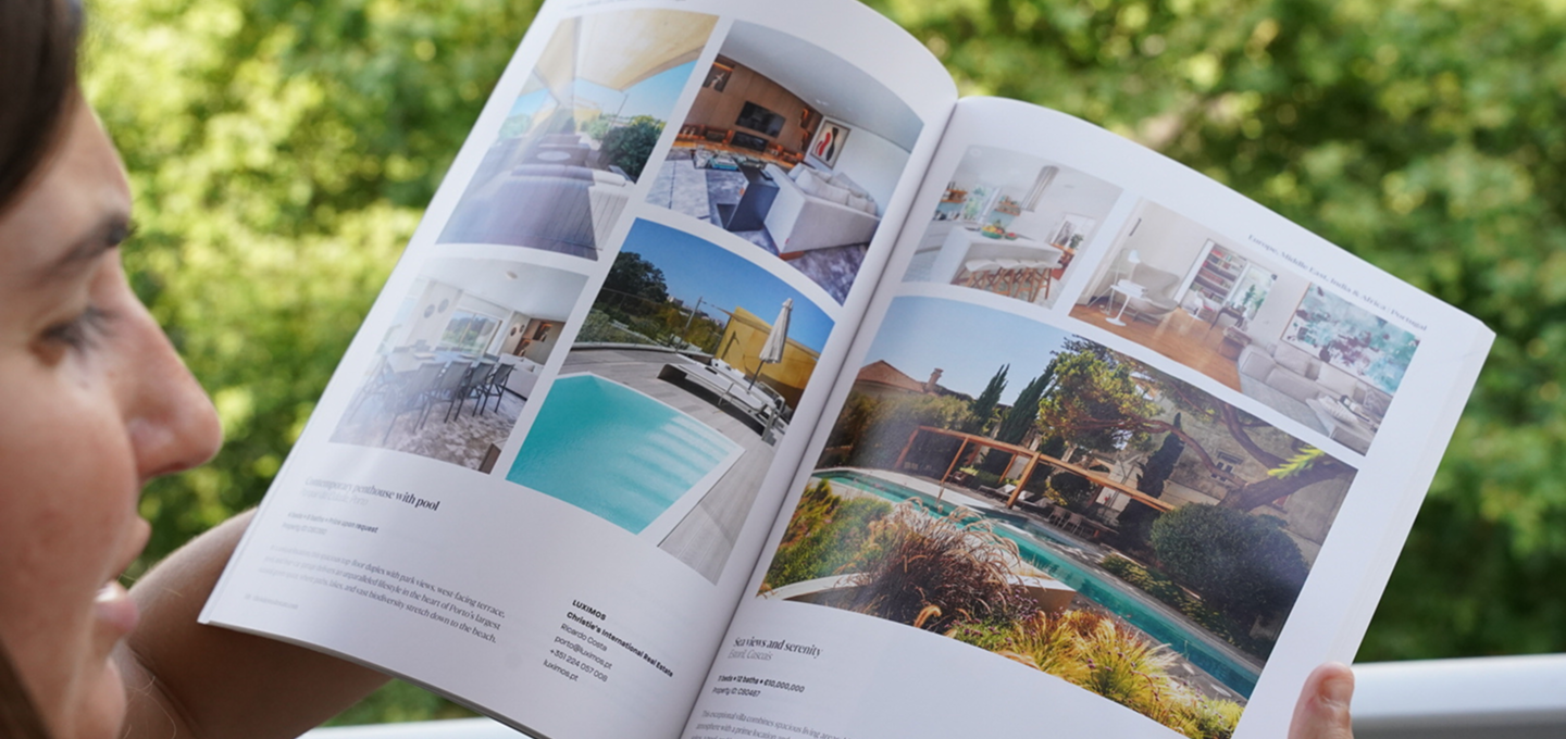 Reading a magazine outdoors